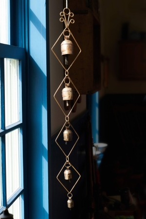 Small Copper Bell Mobile In Window - Earthbound Trading Co.