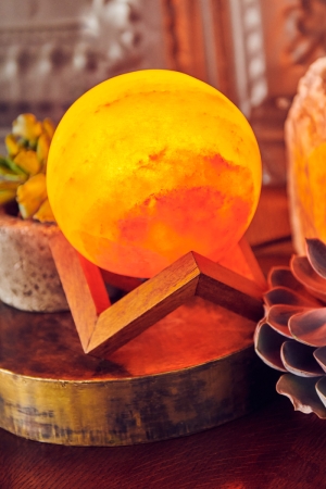 Full Moon Himalayan Salt Lamp in scene - Earthbound Trading Co. 