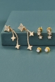 Gold Twinkling Star Earring Set laid out