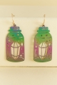 Crystal Potion Bottle Cut Out Earrings laid out